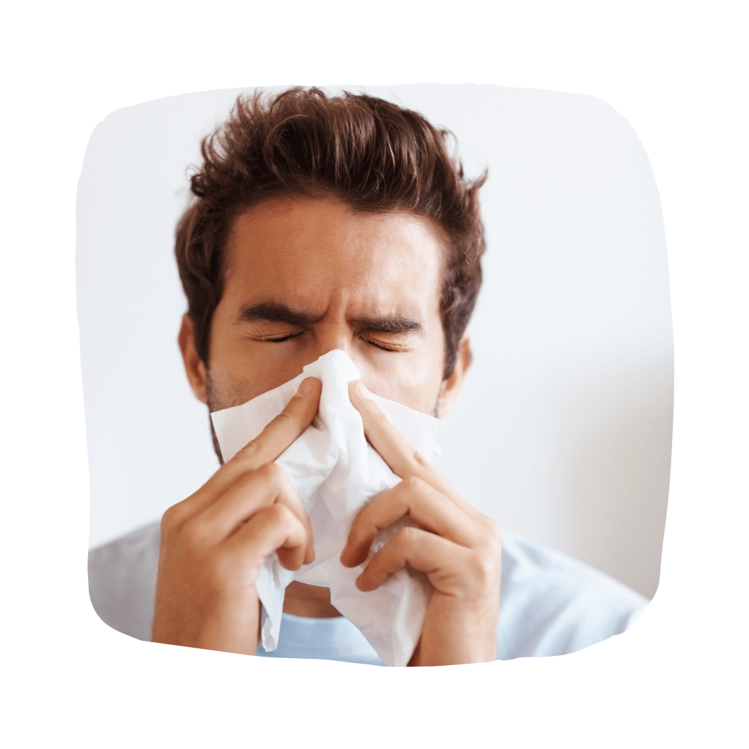 homme qui se mouche